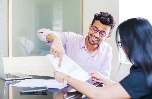 A financial advisor discussing a plan with a customer